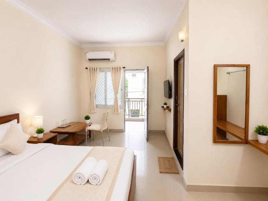 Bright premium balcony room at Hotel Nataraj, Puri